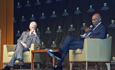 Bill Clinton and Vernon Jordan during question and answer session